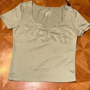 Shows lots of chest area, small, and light green.